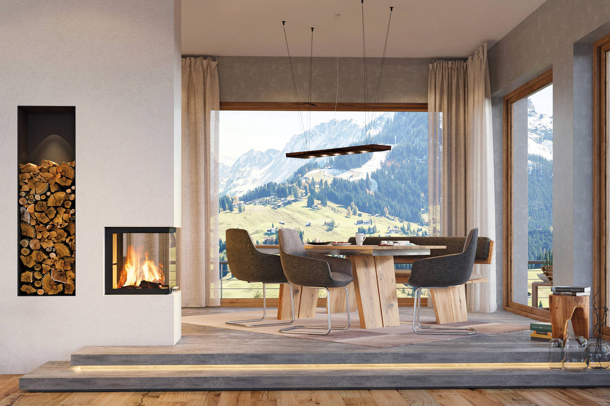 Anschauen und geniessen: Dieses individuell geplante Cheminée mit Stauraumlösung fürs Holz bildet das i-Tüpfelchen auf einer komplett durchdachten Einrichtung. Ganz Baukeramik AG.